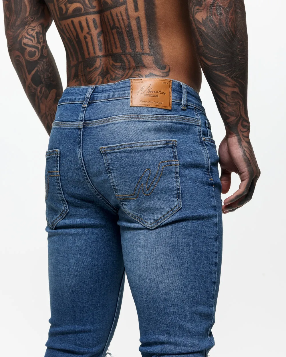 Ripped & Repaired Skinny Jeans - Blue Wash